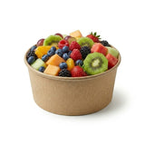 Kraft paper bowl filled with kiwi, berries, melon, and pineapple