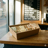 Kraft sandwich catering tray on cafe counter with menu board visible in background