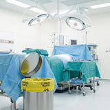 Healthcare staff managing Zeropac Clinical Waste Bag in hospital clinical area