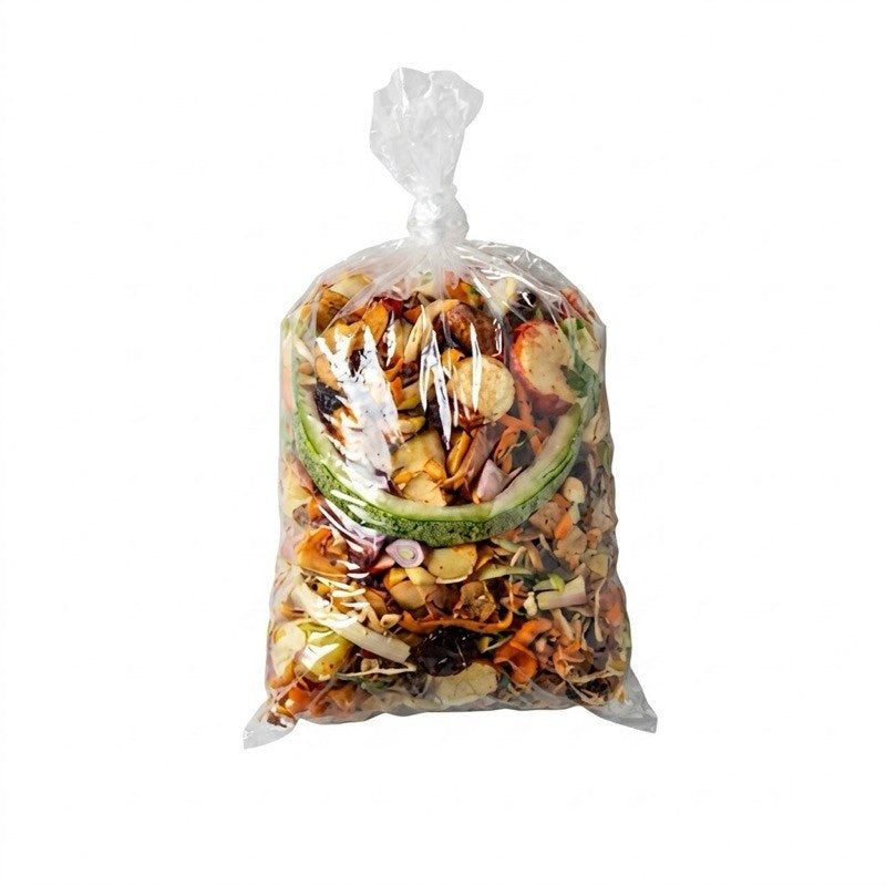 Zeropac water-soluble bin liner holding vegetable scraps in commercial kitchen