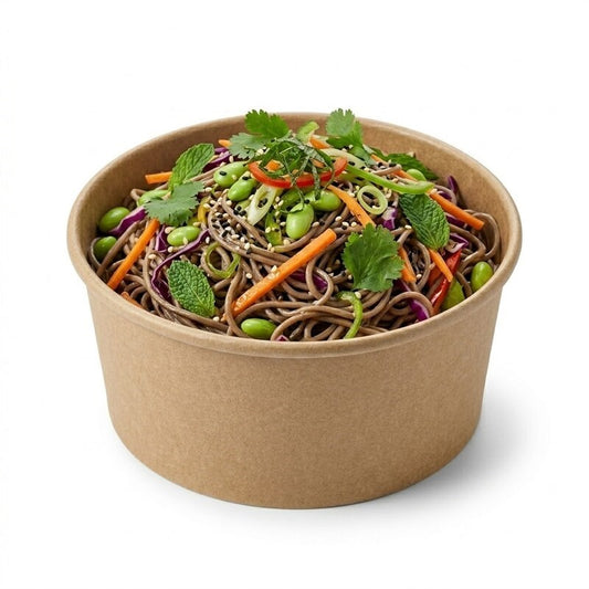 Zeropac bowl holding Asian noodle salad with snap peas and herbs