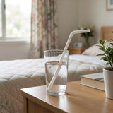 Cozy bedroom scene with Zeropac Paper Straw Flexi White in a glass of water