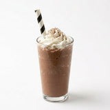 Zeropac Paper Straw Jumbo Black Stripe holding a chocolate beverage with whipped cream