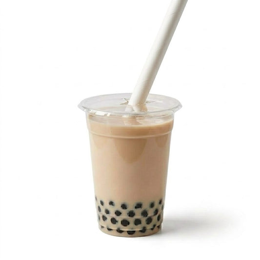 White paper straw in bubble tea drink with tapioca pearls