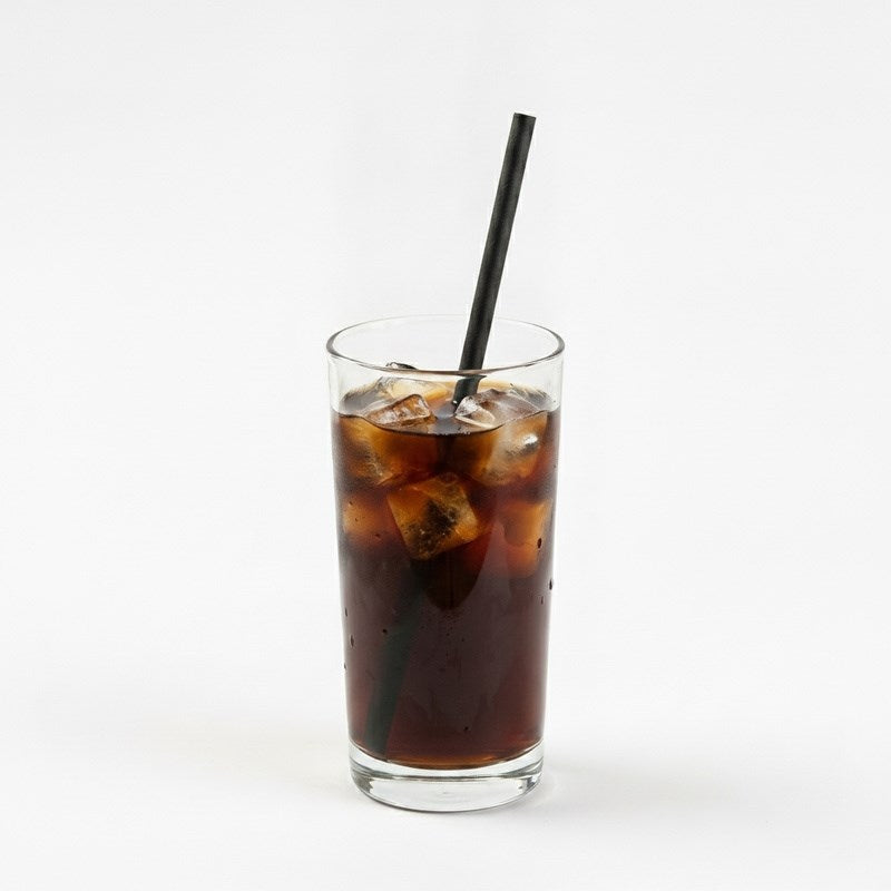 Black paper straw in cola soft drink with ice