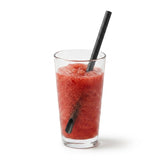 Zeropac Paper Straw Spoon All Black holding a chilled red slushy granita drink