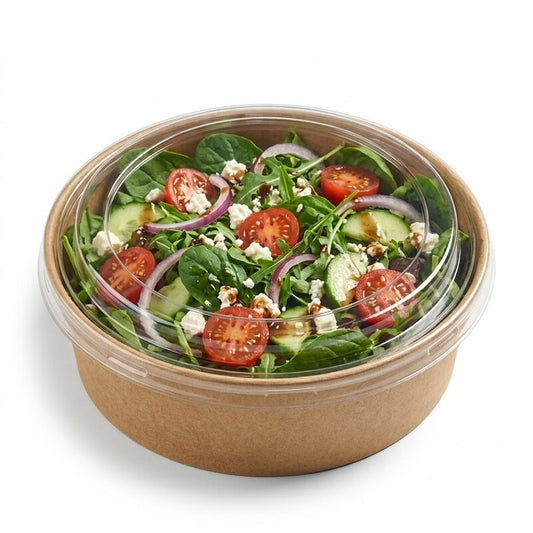 Zeropac kraft bowl with clear PET lid holding fresh garden salad